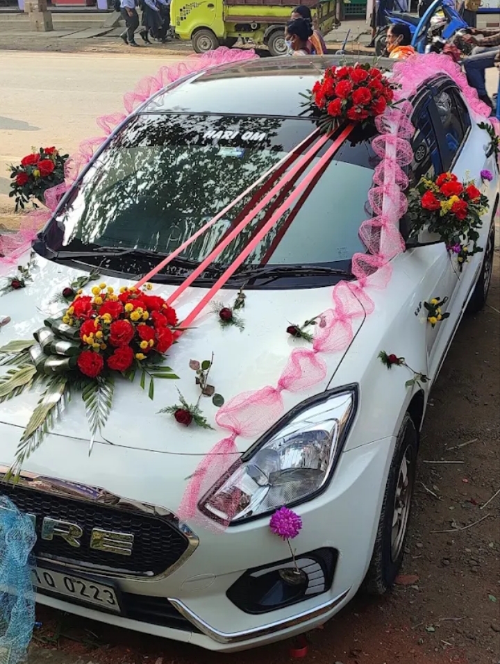 Decorated wedding car by Hariom Car Rental